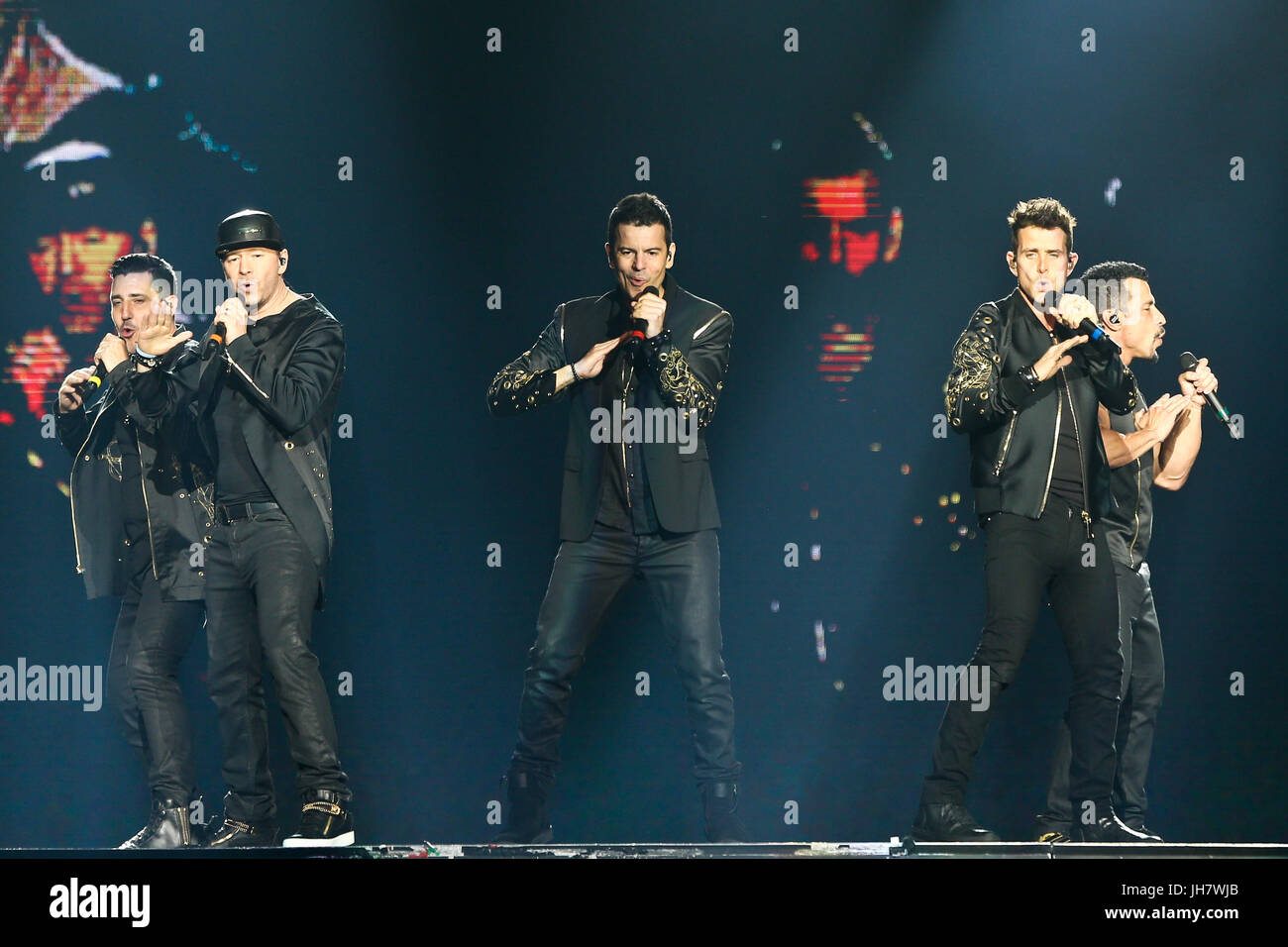 NEW YORK-JUL 7: (L-R) Jonathan Knight, Donnie Wahlberg, Jordan Knight, Joey McIntyre and Danny Wood of New Kids on the Block perform during The Total  Stock Photo