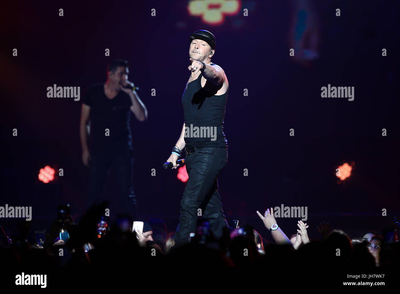 NEW YORK-JUL 7: Donnie Wahlberg of New Kids on the Block perform during The Total Package Tour at NYCB Live at the Nassau Veterans Memorial Coliseum o Stock Photo