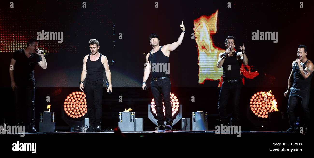 NEW YORK-JUL 7: (L-R) Jonathan Knight, Joey McIntyre, Donnie Wahlberg, Jordan Knight and Danny Wood of New Kids on the Block perform during The Total  Stock Photo