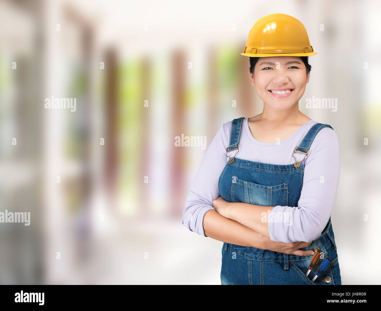 Wearing safety helmet hi-res stock photography and images - Alamy
