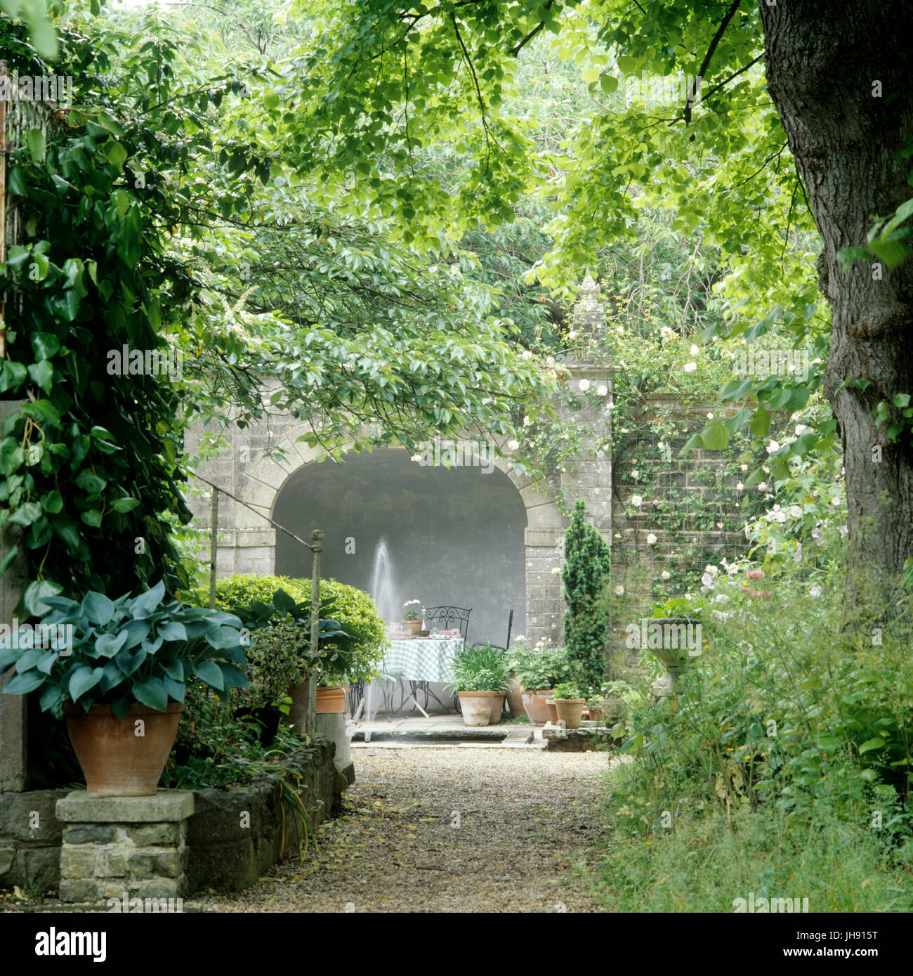 Fountain in garden Stock Photo