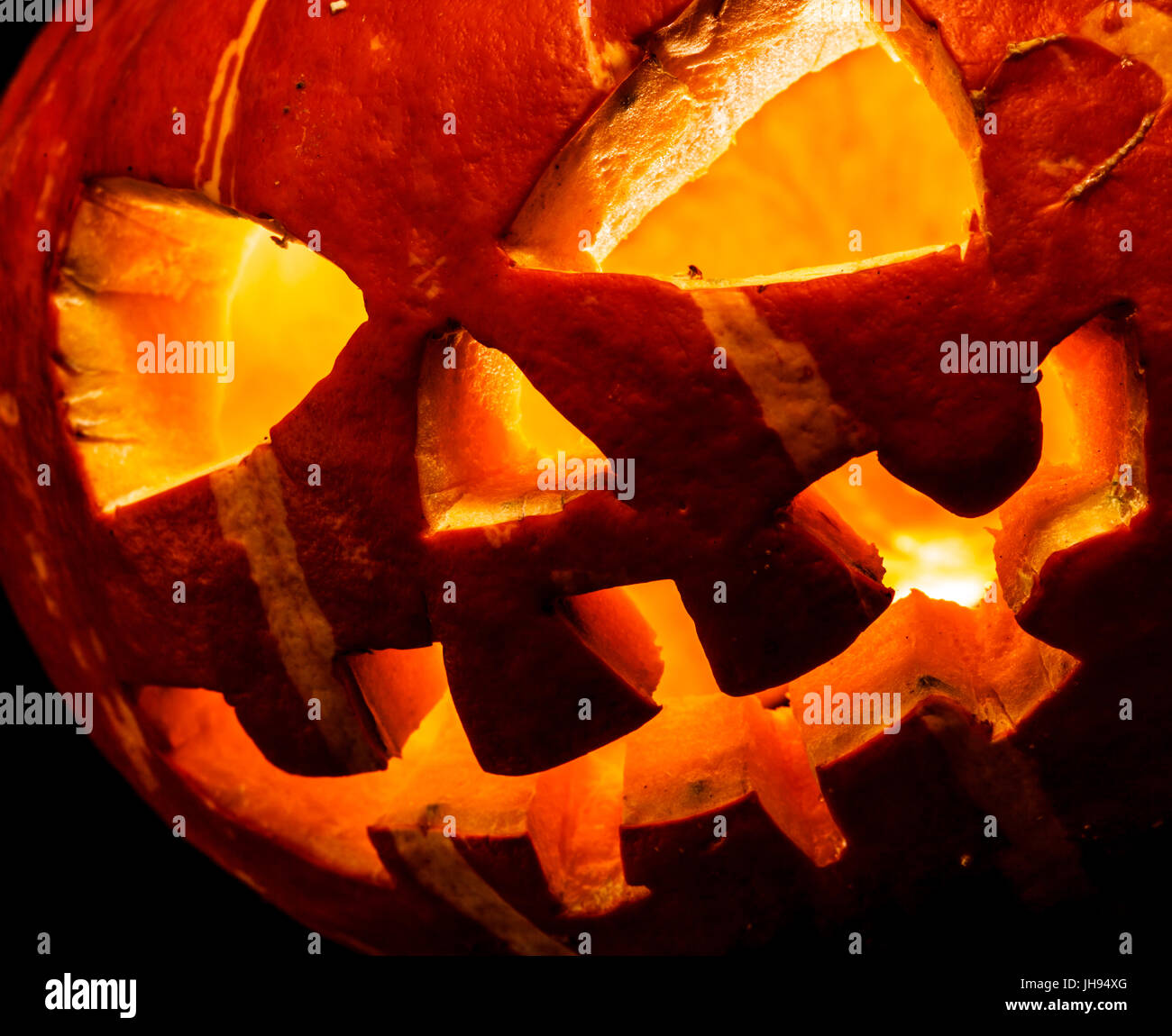 Halloween, old jack o lantern on black background Stock Photo