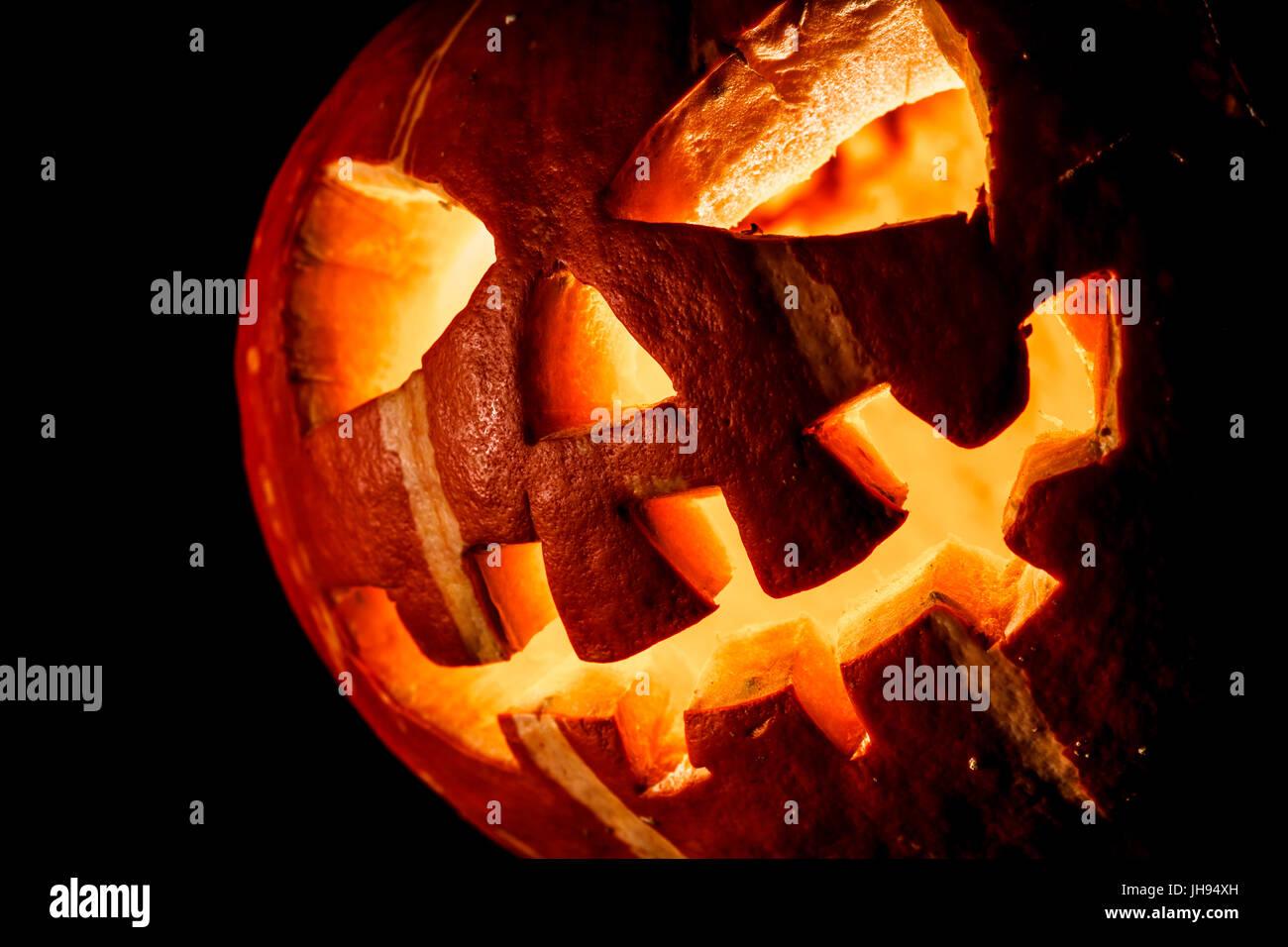 Halloween, old jack o lantern on black background Stock Photo