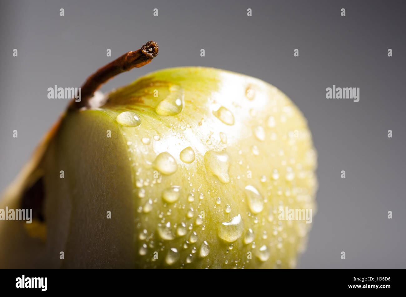 Artistic view of part of a wet apple. Studio Shoot Stock Photo