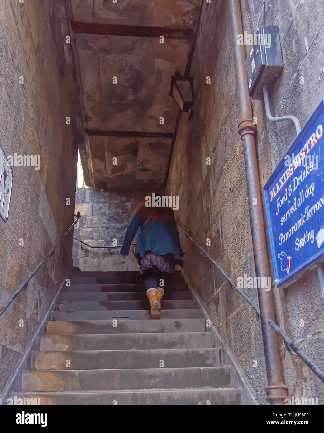 Girl walking up stairs hi-res stock photography and images - Alamy