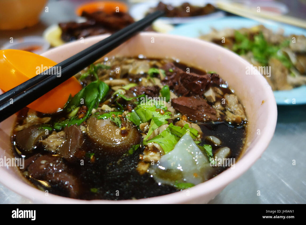 Famous Penang duck kway chap, noodle rolls in soup Stock Photo Alamy
