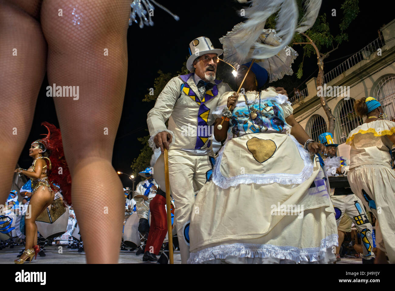 Traditional Murgas and samba schools during the Llamadas (the calling) procession that officially starts the carnival in Montevideo, Uruguay. Is the longest carnival in the world, lasting almost 5 weeks. Stock Photo