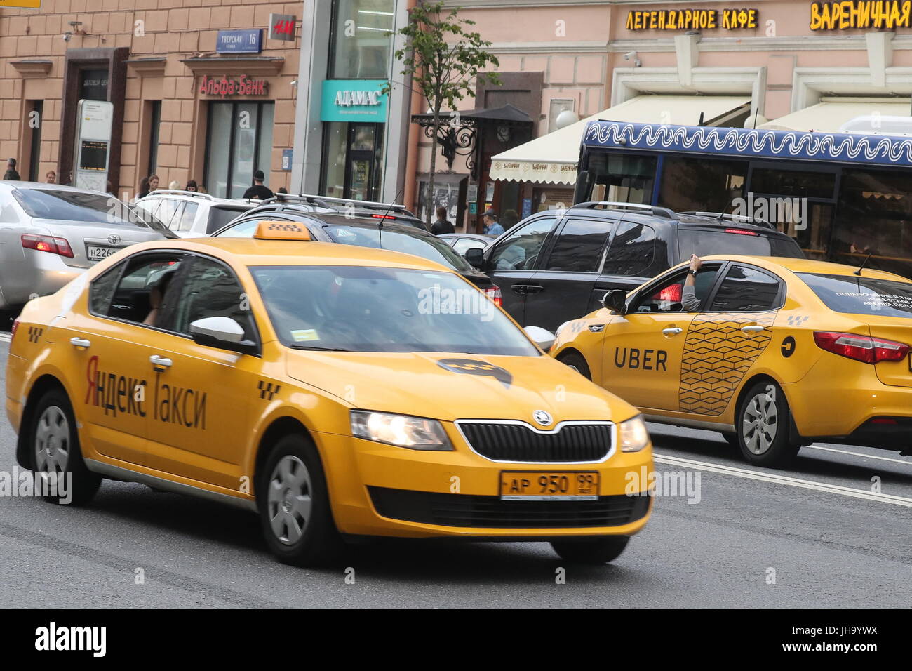 Moscow, Russia. 13th July, 2017. Yandex Taxi and Uber taxicabs in 