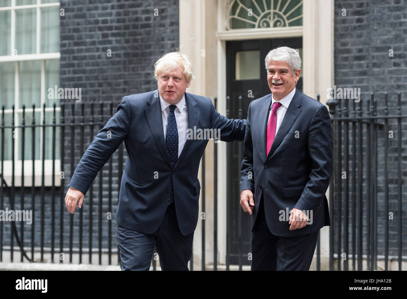 London, UK. 13th July 2017. Boris Johnson, the Secretary of State for Foreign Affairs (L) and Alfonso Dastis, Minister of Foreign Affairs of Spain (R), leave 10 Downing Street after a meeting between British Prime Minister Theresa May and the King Felipe VI of Spain. The King and Queen of Spain pay a state visit to the United Kingdom. Credit: Wiktor Szymanowicz/Alamy Live News Stock Photo
