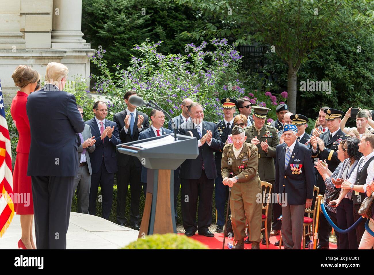 Paris, France. 13th July, 2017. U.S. President Donald Trump and First Lady Melania Trump during an event honoring veterans at the U.S. Embassy July 13, 2017 in Paris, France. The first family is in Paris to commemorate the 100th anniversary of the United States' entry into World War I and attend Bastille Day celebrations. Credit: Planetpix/Alamy Live News Stock Photo