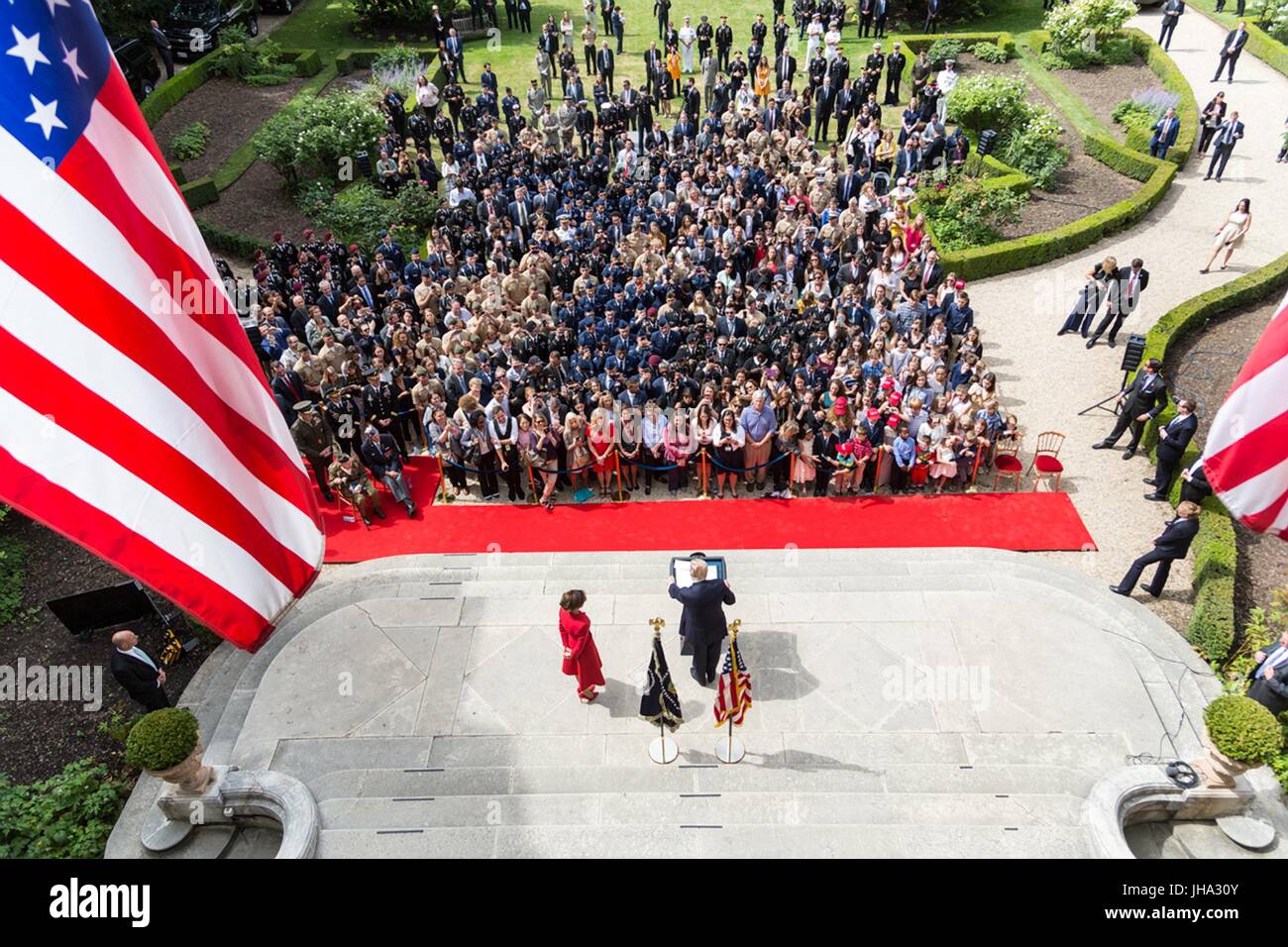 Paris, France. 13th July, 2017. U.S. President Donald Trump and First Lady Melania Trump address veterans gathered at the U.S. Embassy July 13, 2017 in Paris, France. The first family is in Paris to commemorate the 100th anniversary of the United States' entry into World War I and attend Bastille Day celebrations. Credit: Planetpix/Alamy Live News Stock Photo