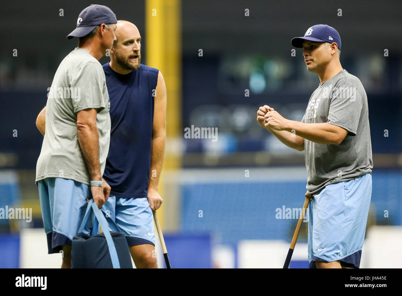 St. Petersburg, Florida, USA. 13th July, 2017. WILL VRAGOVIC | Times.From left Tampa Bay Rays bench coach Tom Foley (6), first base coach Rocco Baldelli (15), and manager Kevin Cash (16) talk on the field during an optional workout for Tampa Bay Rays at Tropicana Field in St. Petersburg, Fla. on Thursday, July 13, 2017. Credit: Will Vragovic/Tampa Bay Times/ZUMA Wire/Alamy Live News Stock Photo
