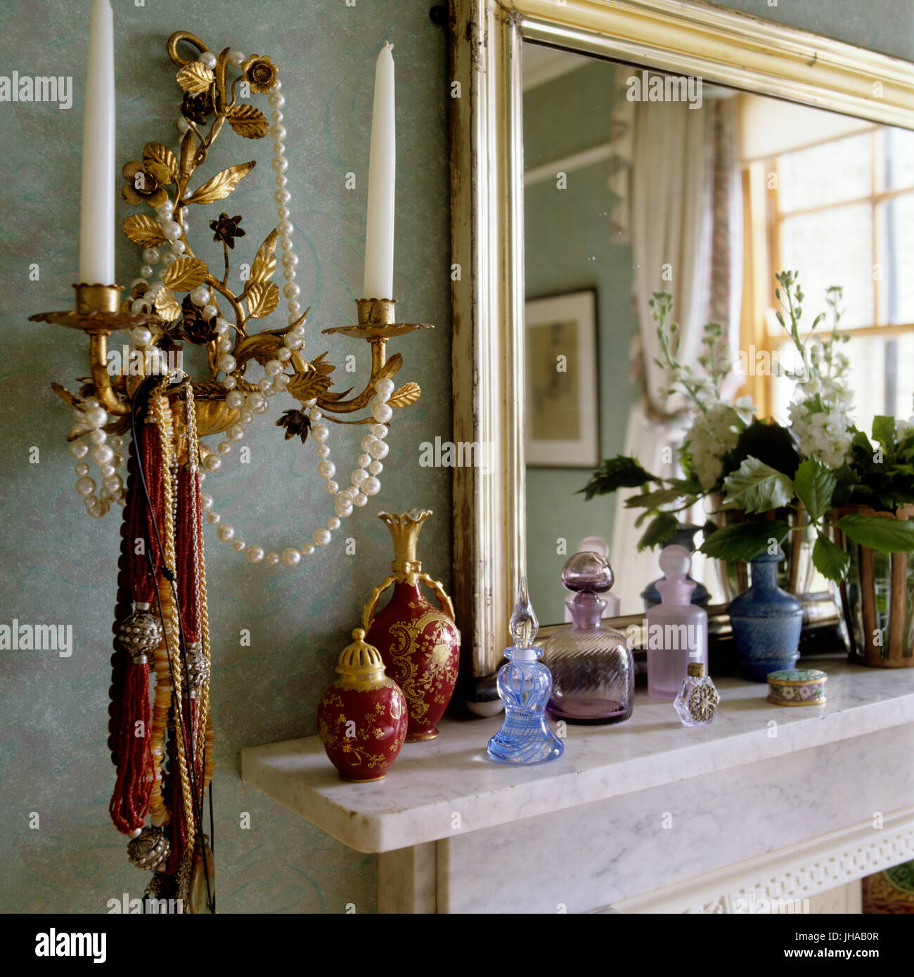 Candle holder by mantelpiece Stock Photo Alamy