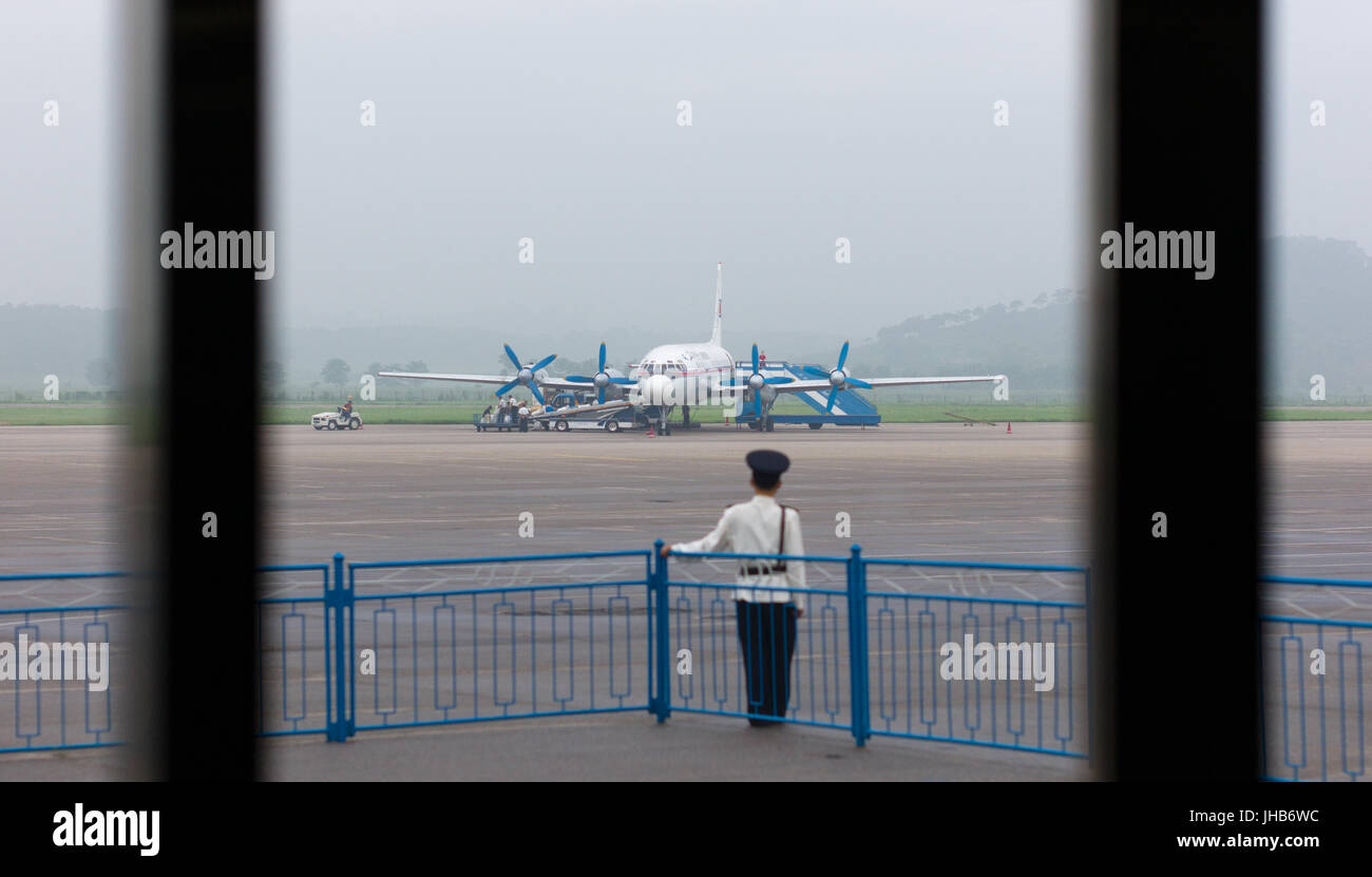 Pyongyang Sunan Ilyushin Il-18D standing at Pyongyang Sunan International Airport and ...