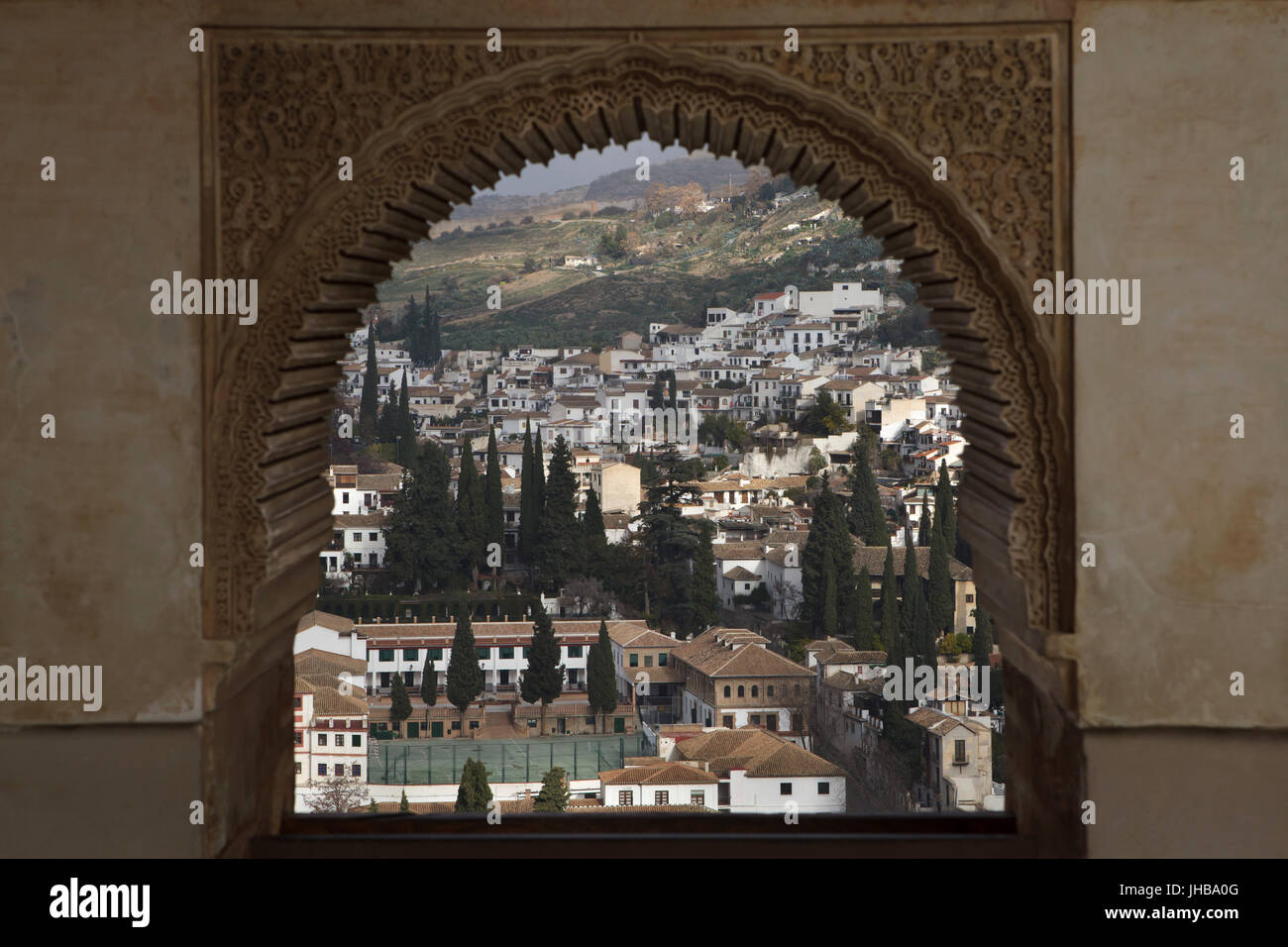 El Albayzin district pictured from the Ladies Tower (Torre de las Damas) in the Garden of the Partal (Jardines del Partal) in the palace complex of the Alhambra in Granada, Andalusia, Spain. Stock Photo