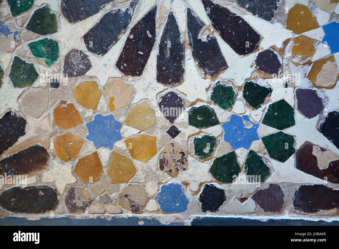 Geometric mosaic made from glazed tiles called Alicatados on the floor in the Hall of the Two Sisters (Sala de Dos Hermanas) in the Palace of the Lions (Palacio de los Leones) in the complex of the Nasrid Palaces (Palacios Nazaríes) in the Alhambra in Granada, Andalusia, Spain. Stock Photo