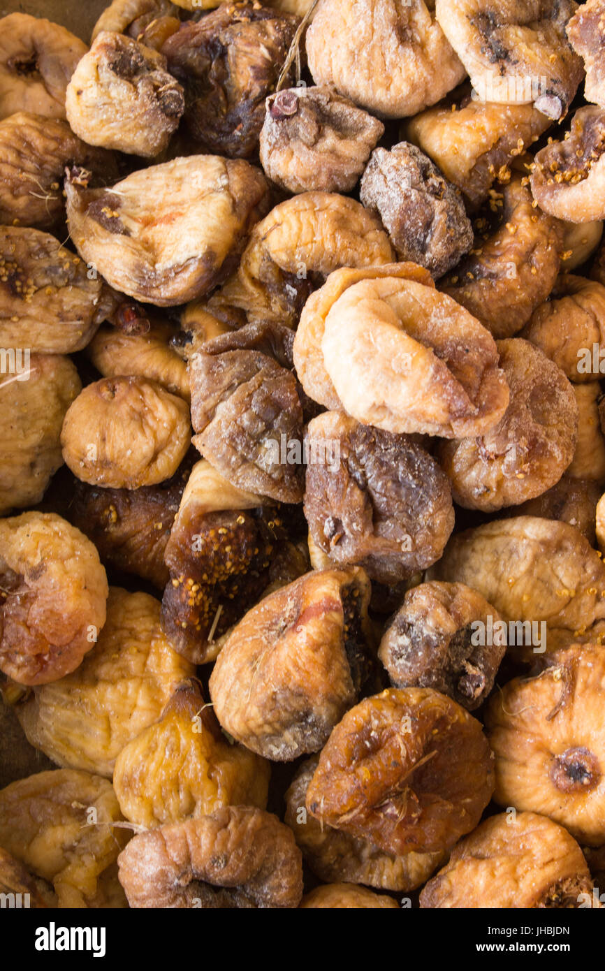 brown dried dates lie on a pile Stock Photo