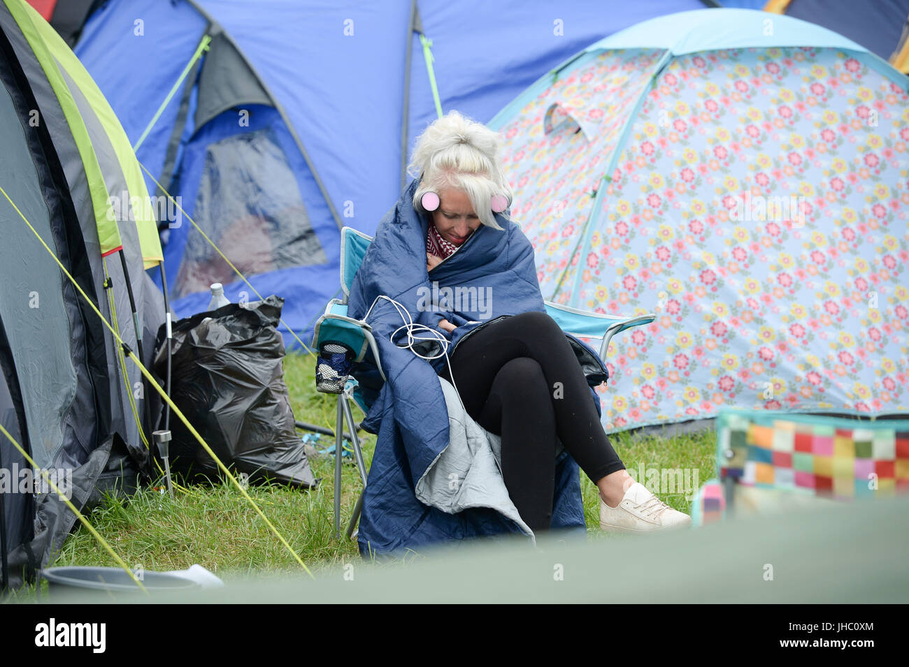 Sleeping bag amongst tents glastonbury festival hires stock