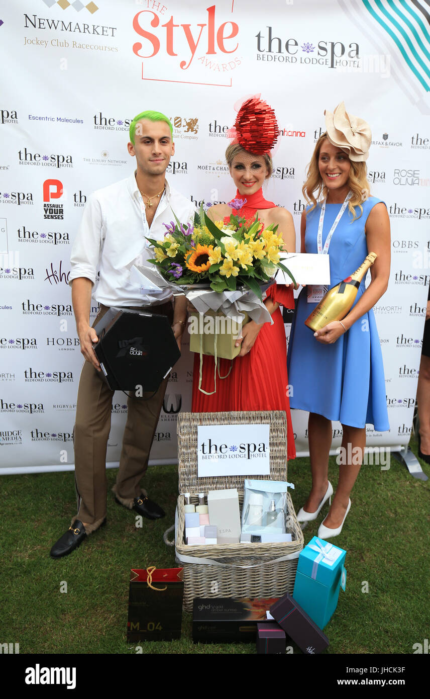 Ana Pribylova (centre), winner of the Style Awards Best Dressed Lady Competition during Ladies Day of The Moet and Chandon July Festival at Newmarket Racecourse. Stock Photo