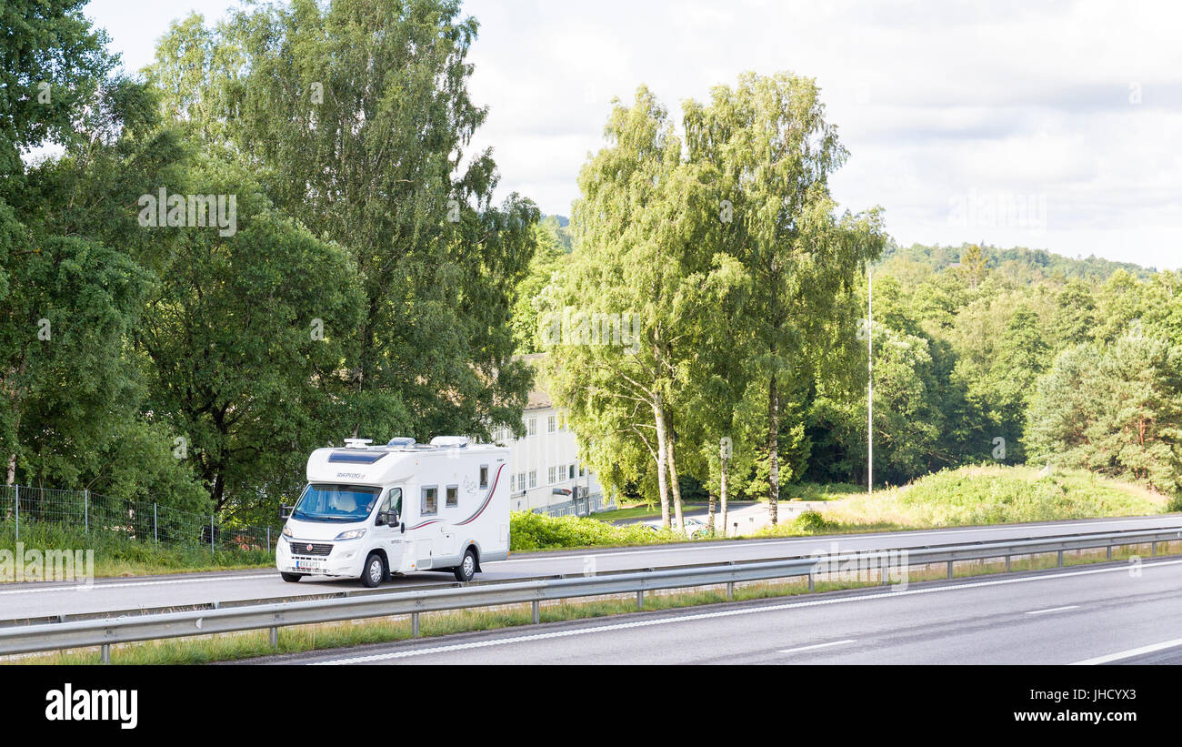 Motorhome campervan recreational vehicle RV travelling on motorway freeway highway  Model Release: No.  Property Release: No. Stock Photo