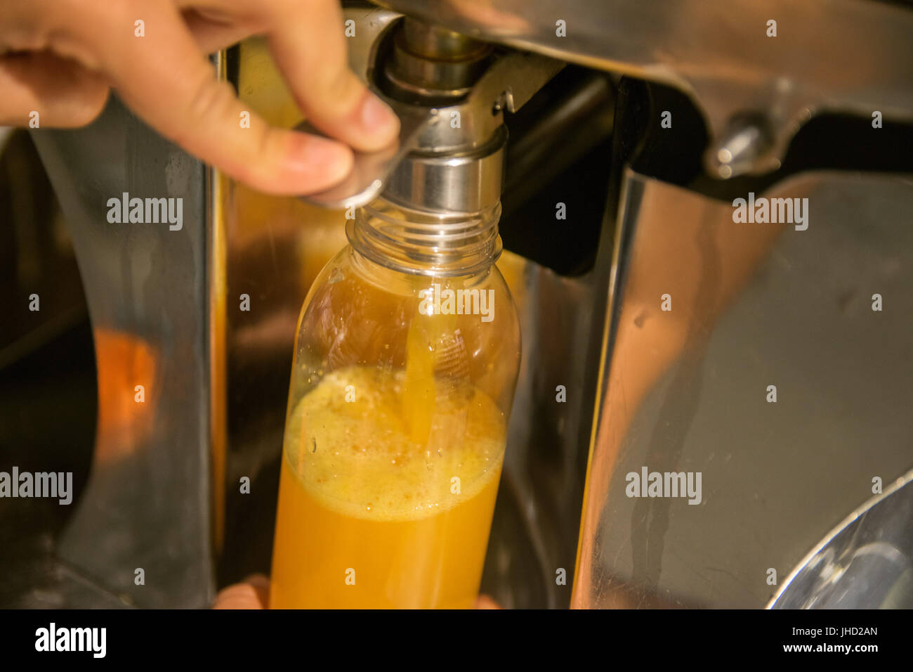 Orange Juice Dispenser Stock Photo - Alamy