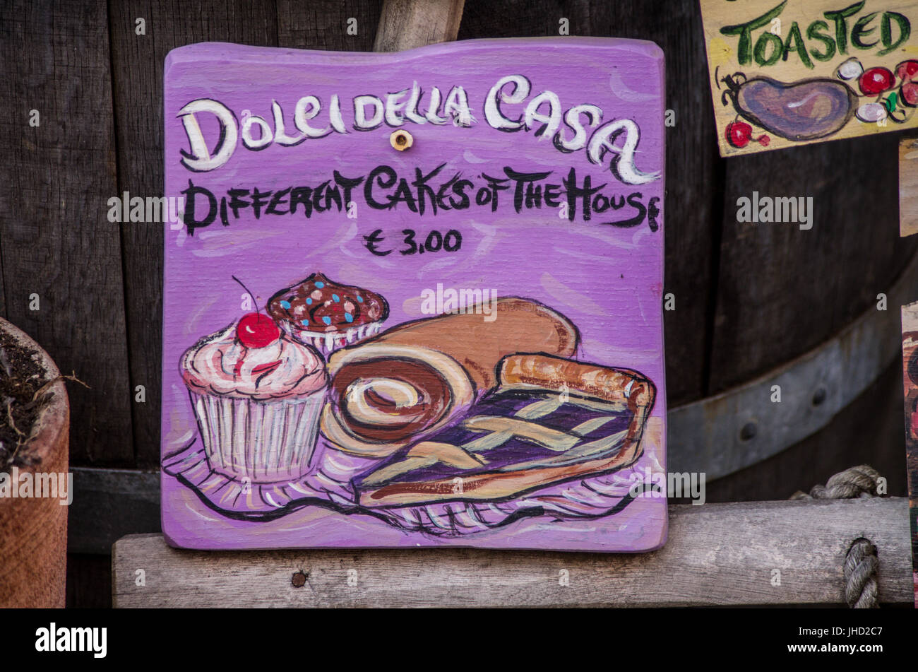 This is an handmade food signboard, met in a small tuscany village, where a shop was selling typicals product of food and wine. Stock Photo