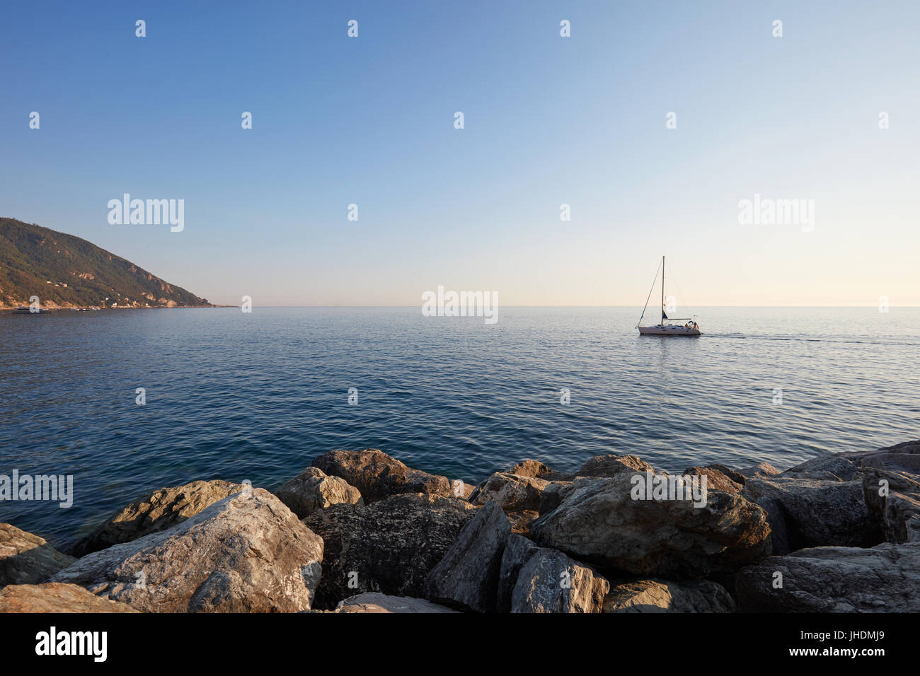Mediterranean blue, calm sea and horizon, clear sky in Italy Stock