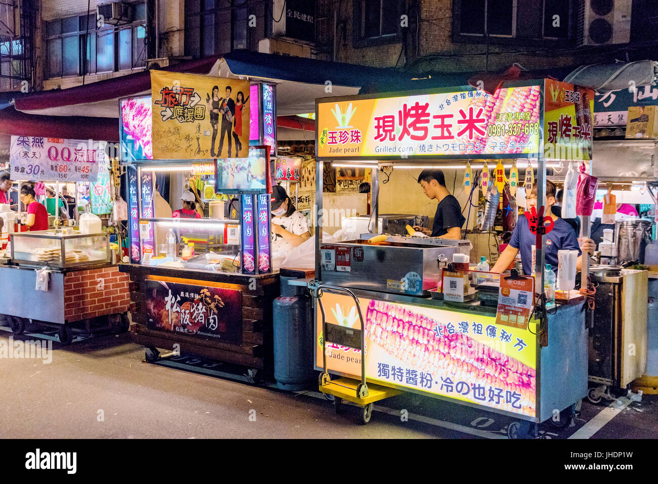TAIPEI, TAIWAN - JUNE 19: These are food stalls in Raohe street night market stalls like these are very common in Taiwanese night markets on June 19,  Stock Photo