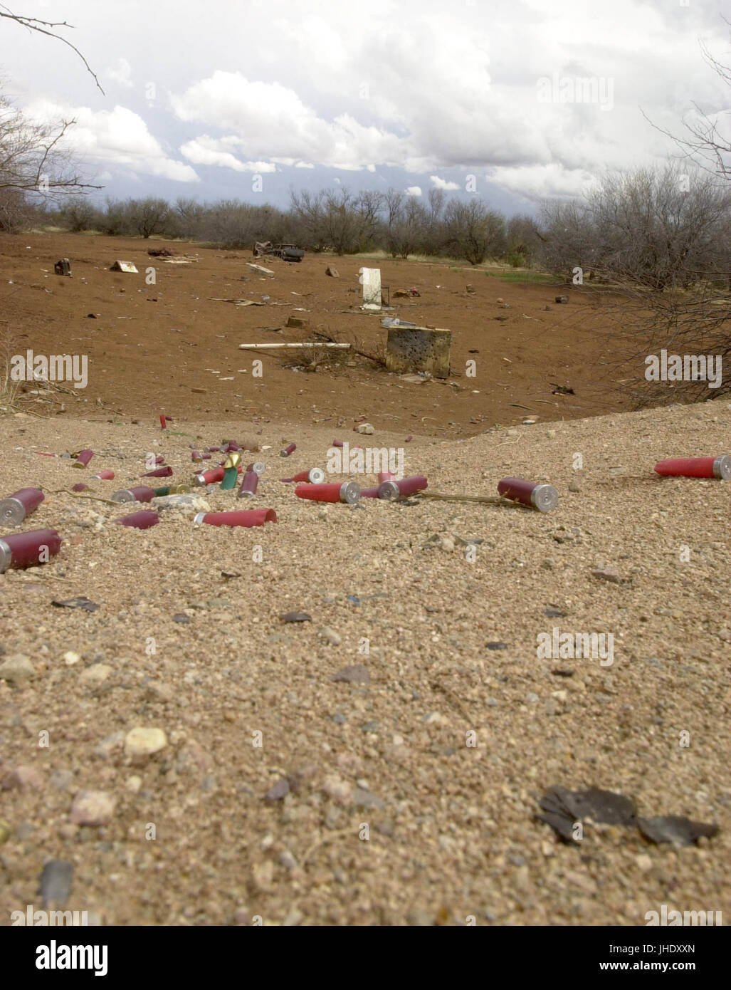 Spent ammunition shells remain in the desert in an area known for