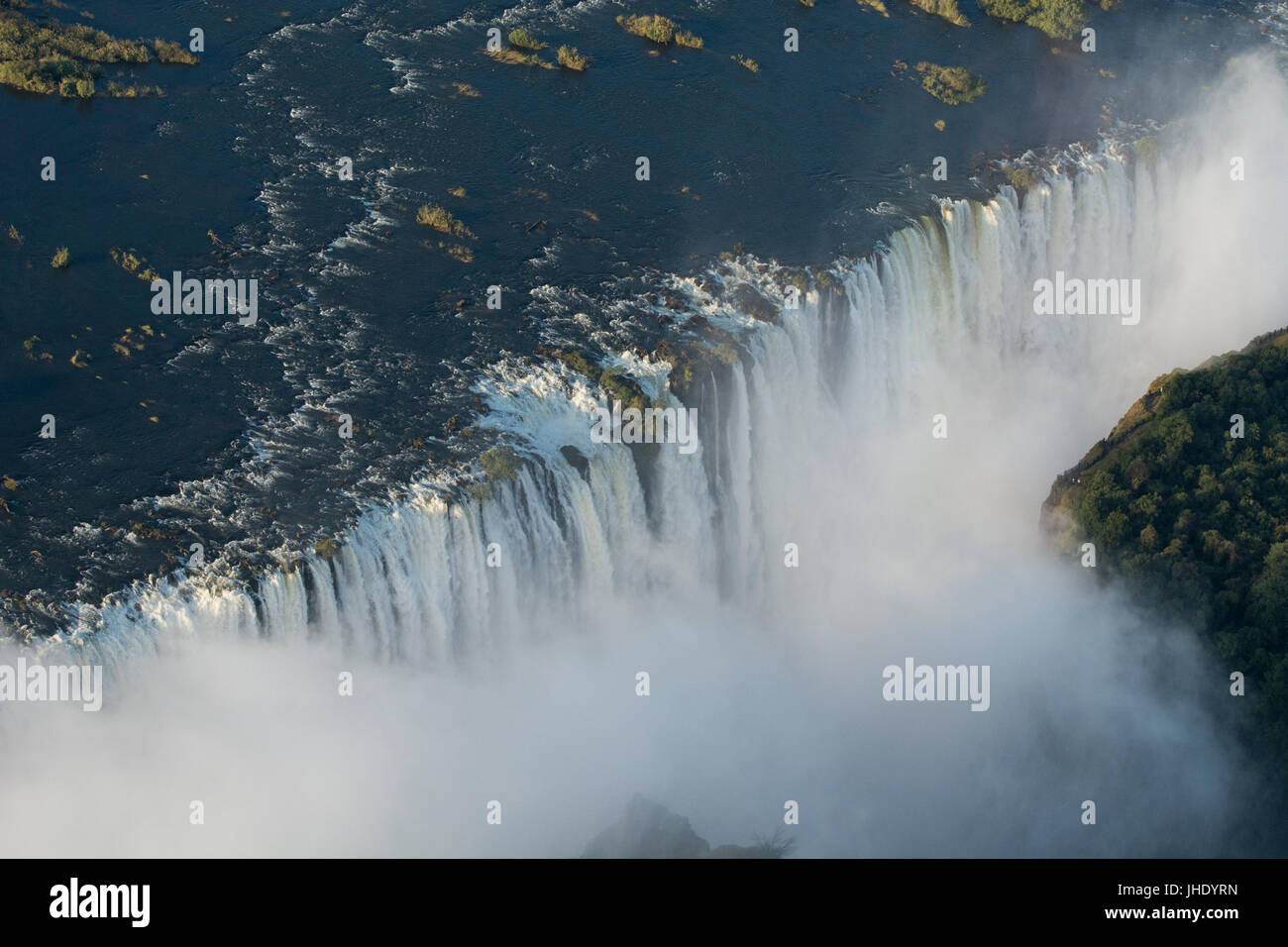 Southern Africa, at the border between Zambia and Zimbabwe. Livingston, Zambia and Victoria Falls, Zimbabwe. Aerial view of Victoria Falls, or Mosi-oa Stock Photo