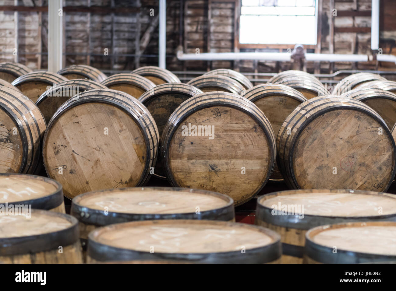 Bourbon Barrel Storage Room with barrels standing and rolling Stock