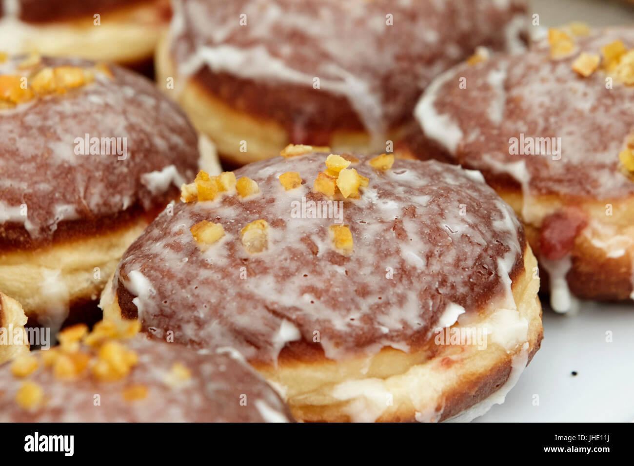 sugar frosted coating on donuts Stock Photo