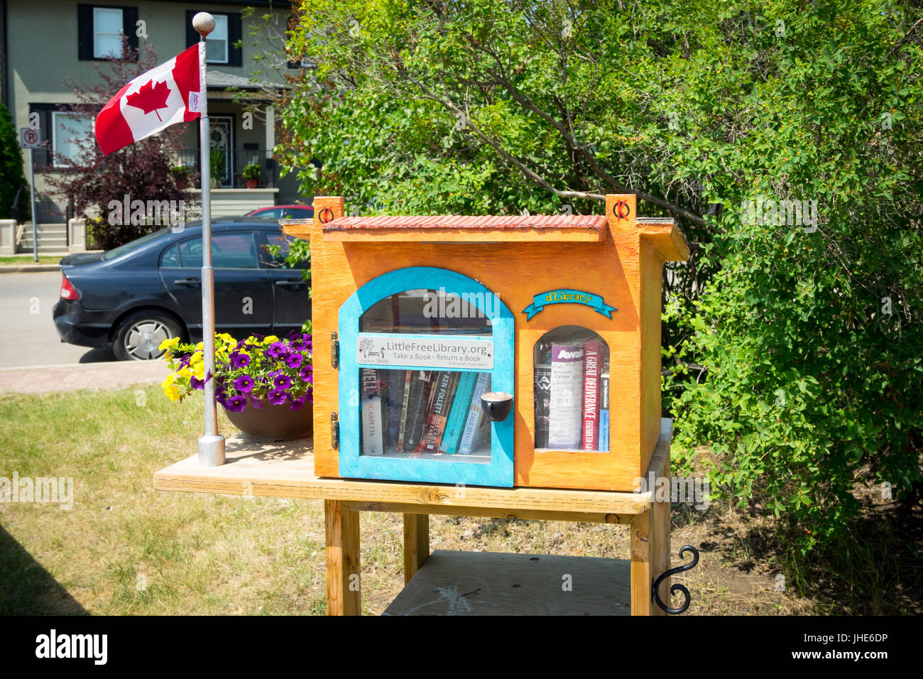 A cute Little Free Library book exchange box in Saskatoon, Saskatchewan, Canada. Stock Photo