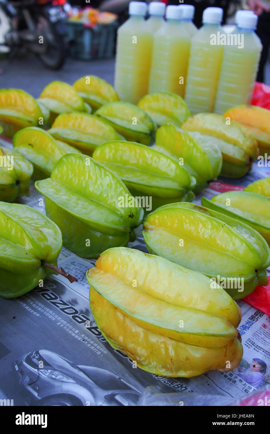 starfruit selling in wet market Stock Photo