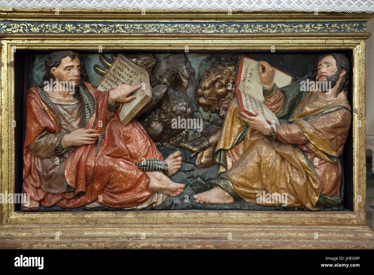 Saint John the Evangelist (R) and Saint Mark the Evangelist (L). Polychrome wooden panel in the Church of Santa María de la Alhambra in the palace complex of the Alhambra in Granada, Andalusia, Spain. Stock Photo