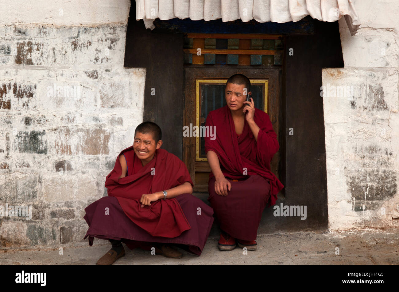 Monks inside Tashilumpo Monastery at Shigatse, Tibet, China. Stock Photo