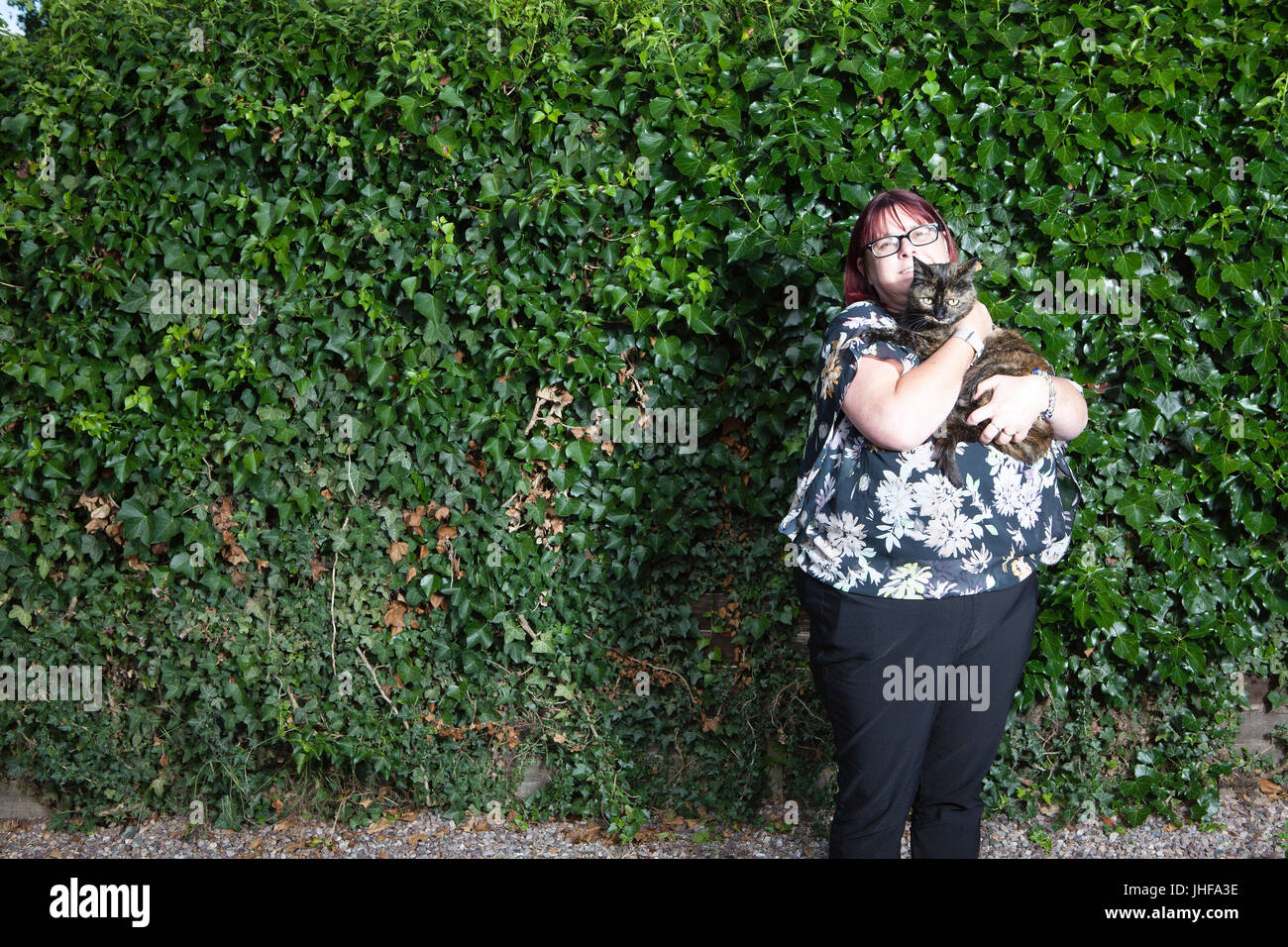 Claire Hopkins and her cat Tinks named Cat of the Year 2016 in annual National Cat Awards for saving her family from a house fire Stock Photo