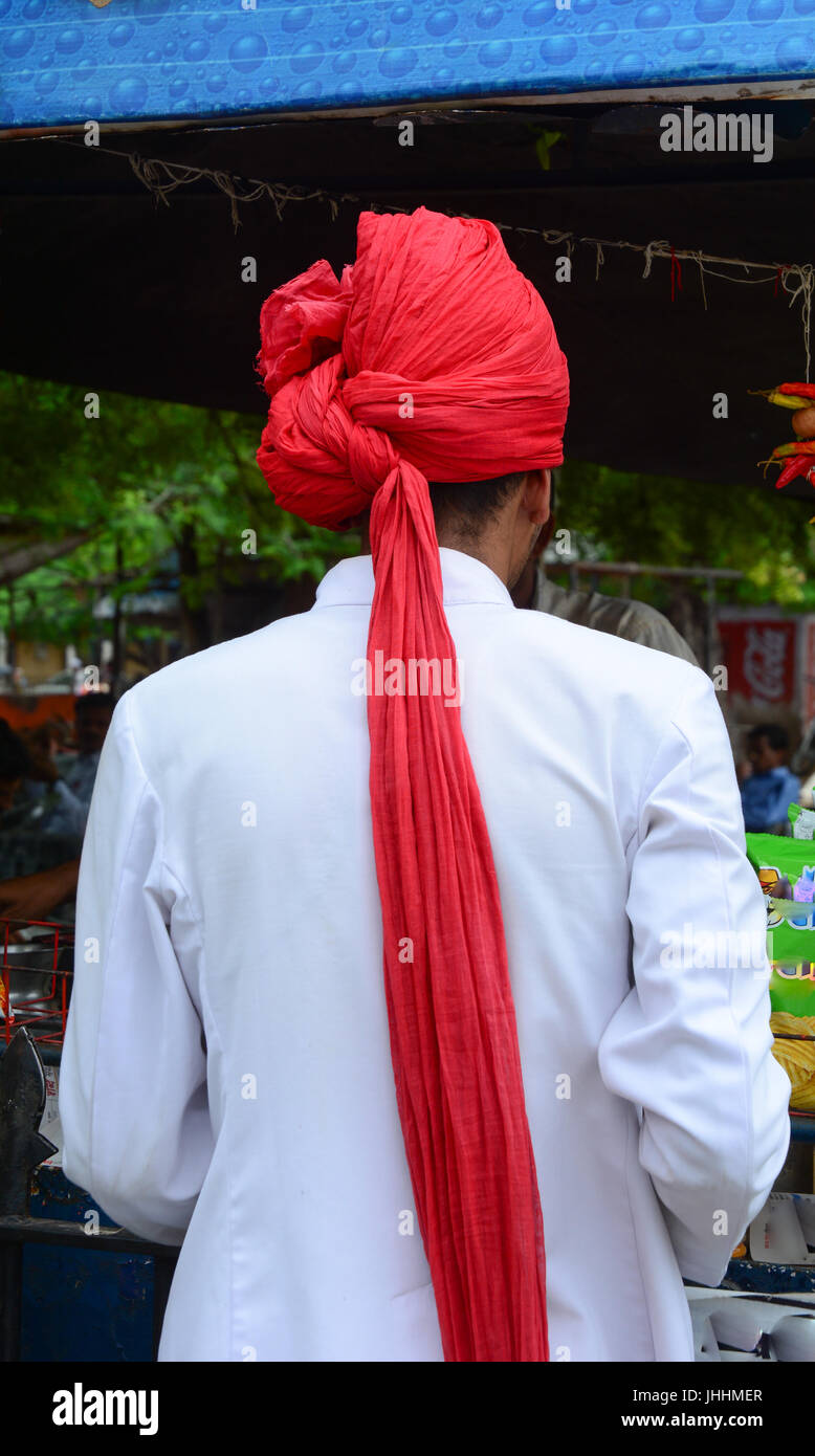 Look from behind Indian man's back with traditional clothes. Stock Photo