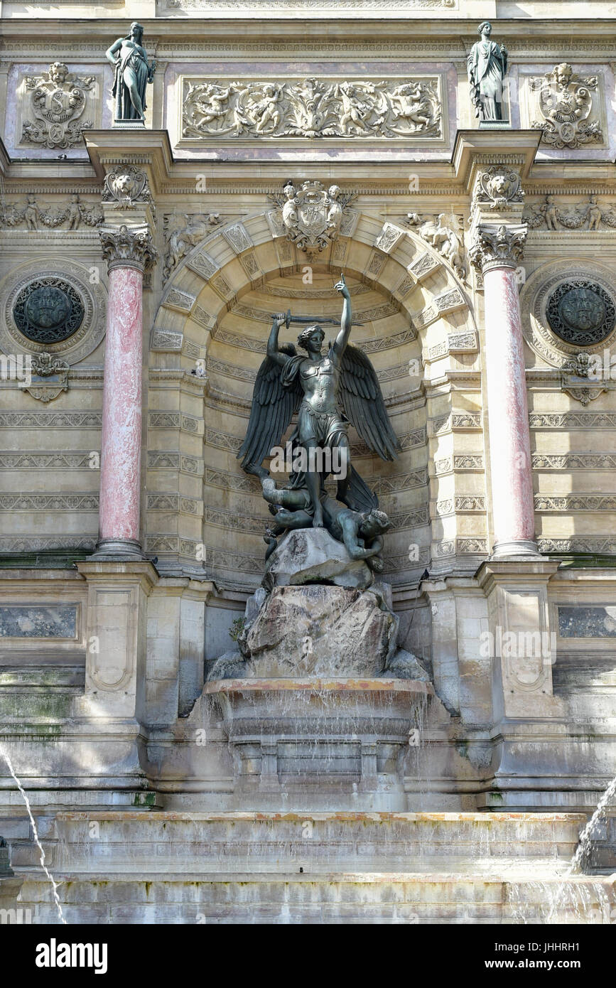 The Fontaine Saint-Michel is a monumental fountain located in Place Saint-Michel in the 5th arrondissement in Paris. Stock Photo