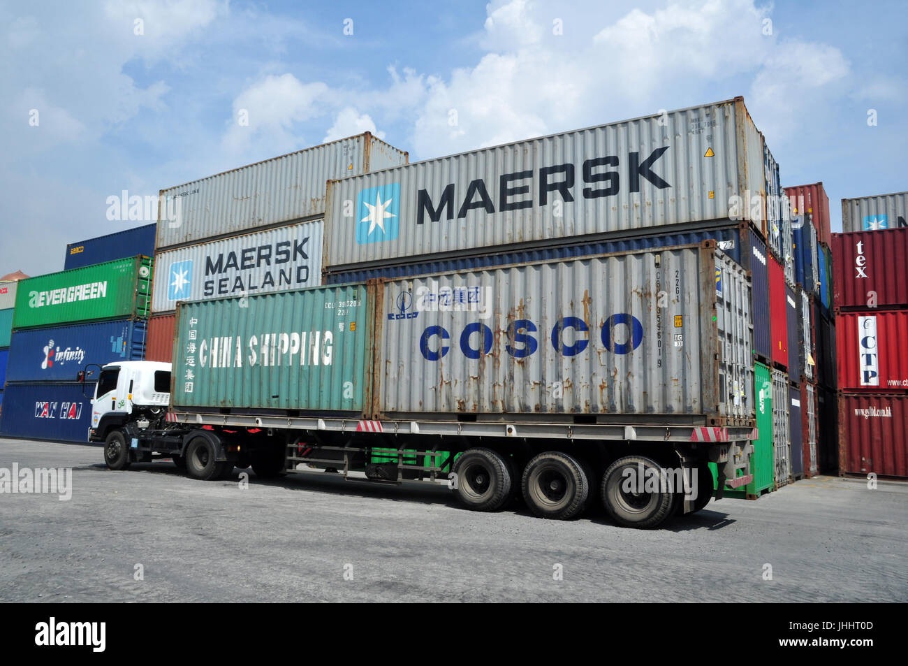 Jakarta, Indonesia May 6, 2017 Container trucks passed between