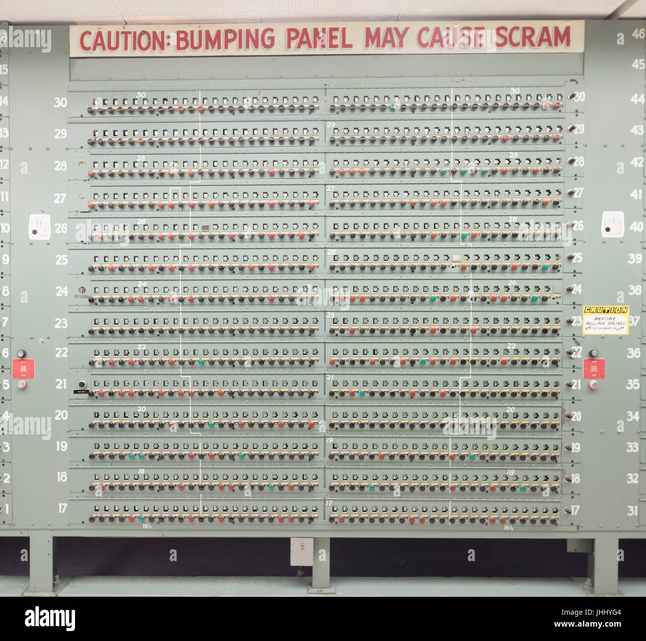 sign: caution bumping panels may cause SCRAM, details of electrical panels, Control Room, The B Reactor Hanford, near Richland, Washington Stock Photo