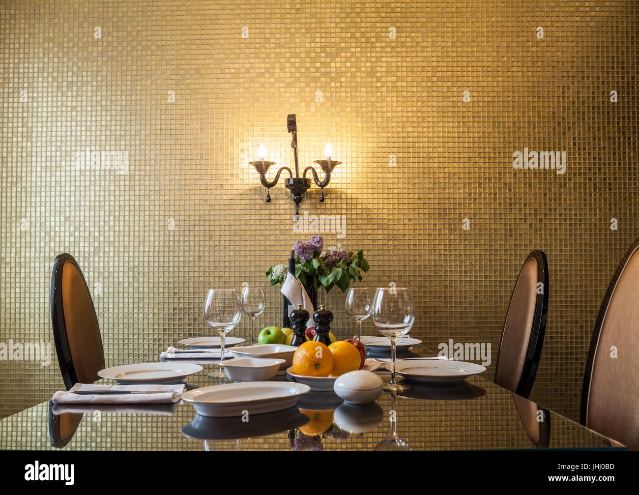 Set the table in the golden living room Stock Photo Alamy