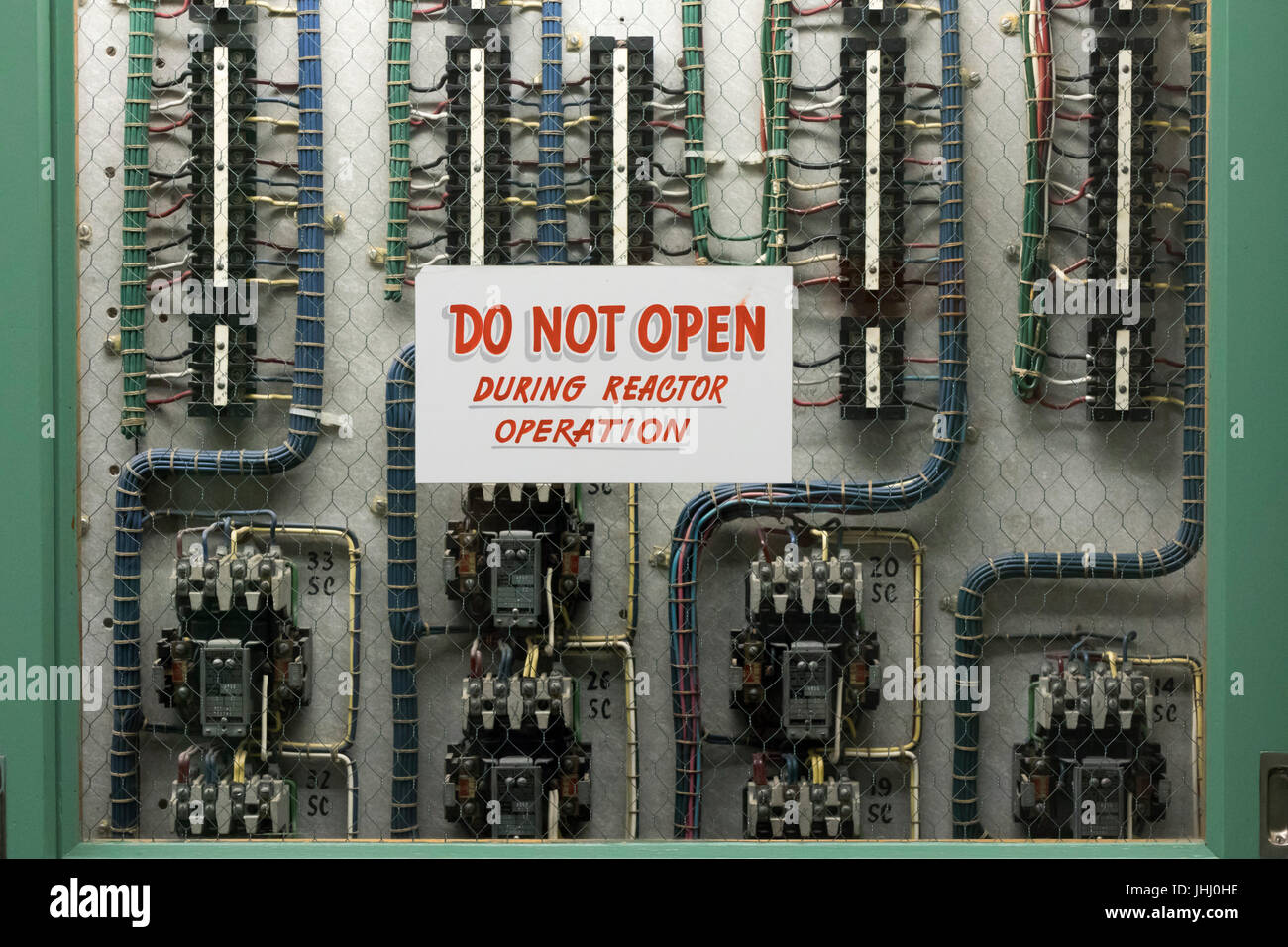 sign: do not open during reactor operation, electric power distribution panels, The B Reactor Hanford, near Richland, Washington Stock Photo