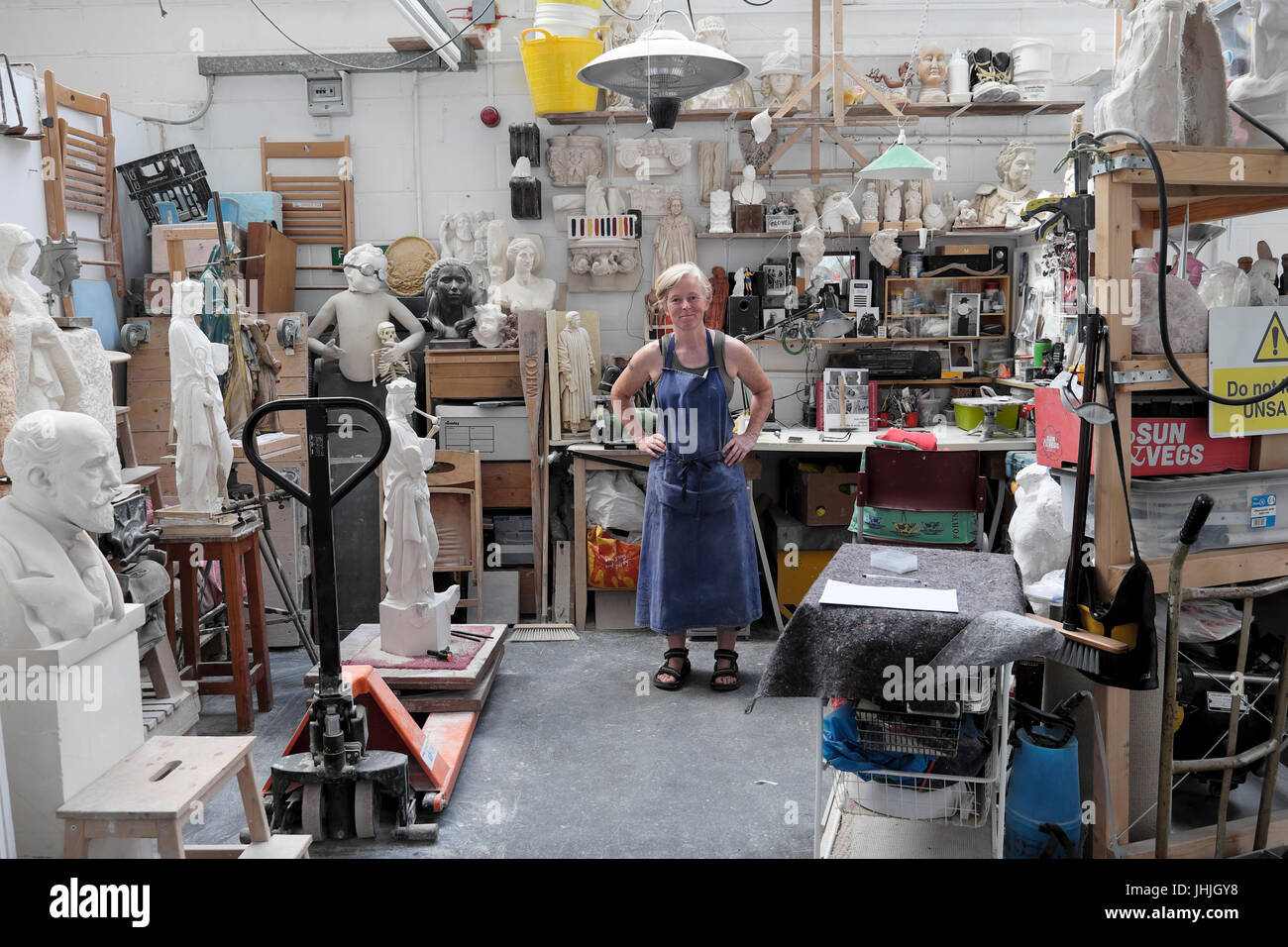 Stone carver sculptor Nina Bilbey in her sculpture studio open to visitors at the E17 Art Trail 2017 in Walthamstow East London UK   KATHY DEWITT Stock Photo