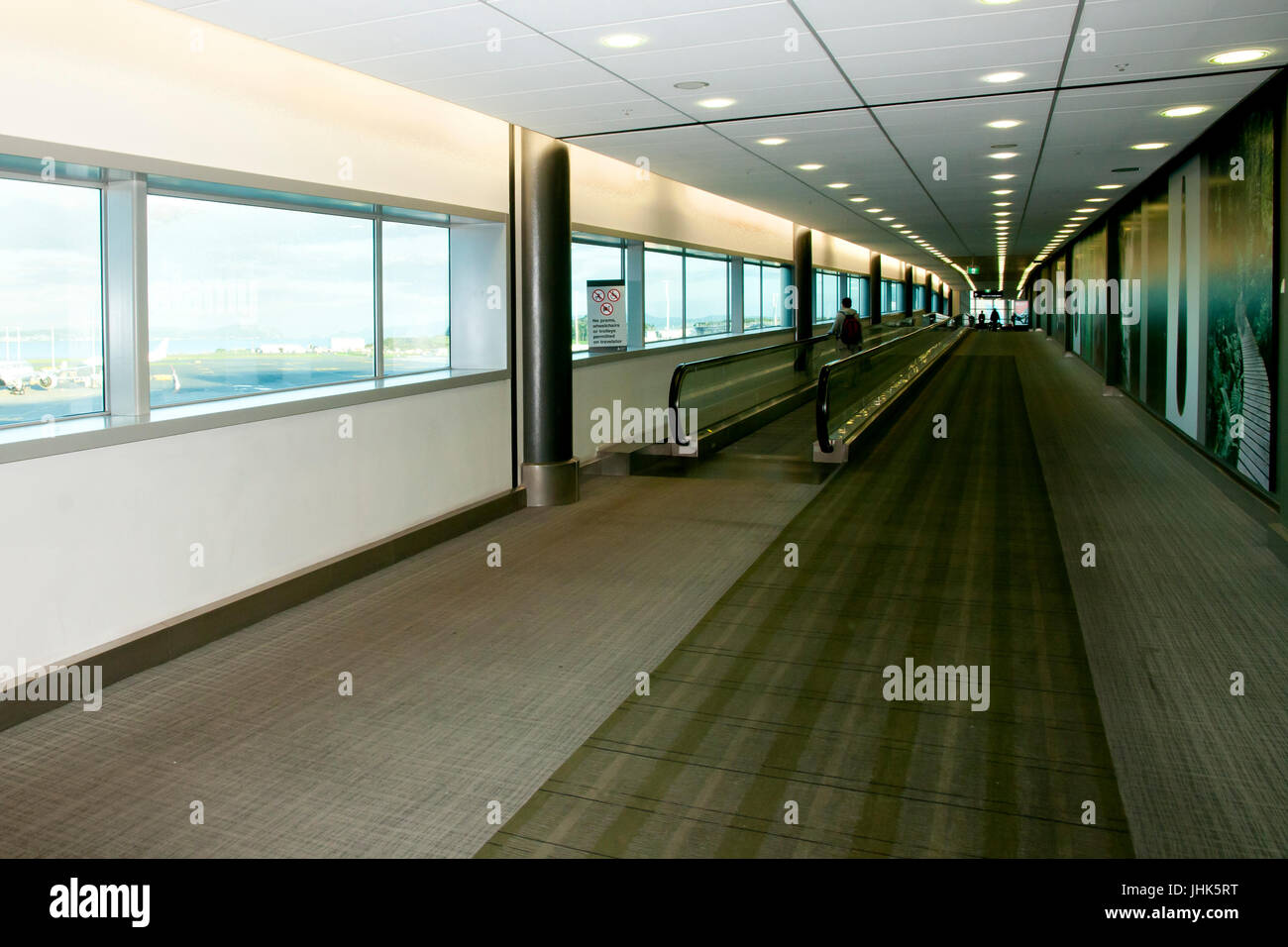 Moving Walkway in Airport Corridor Stock Photo