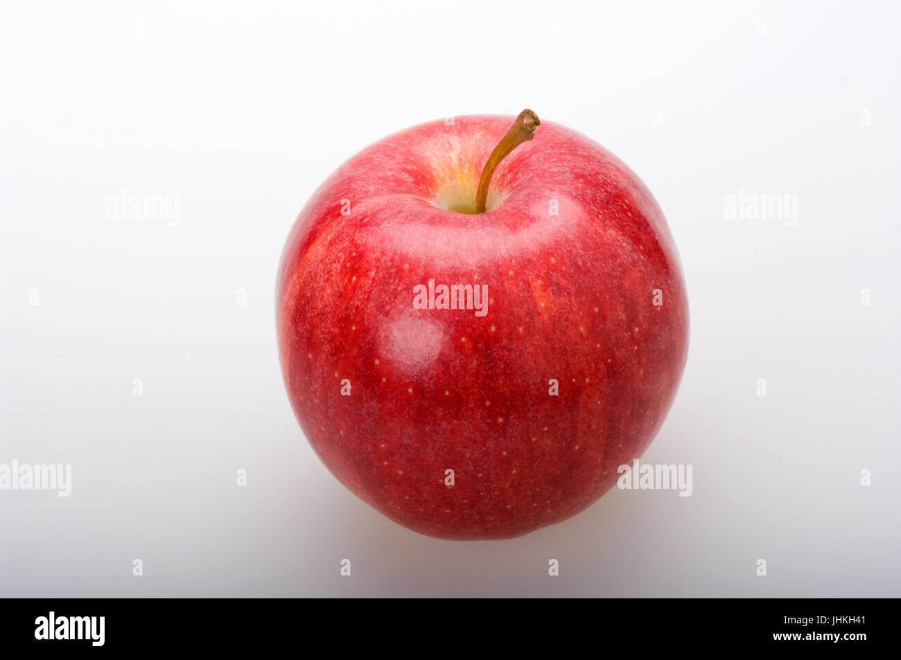 Tasty red apple on white background in front view Stock Photo - Alamy