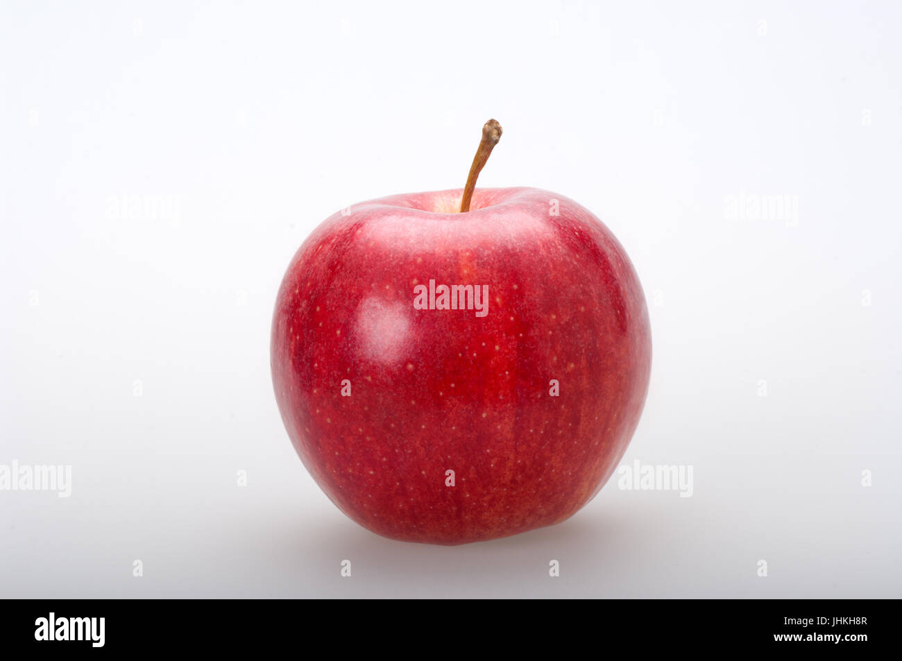 Tasty red apple on white background in front view Stock Photo - Alamy