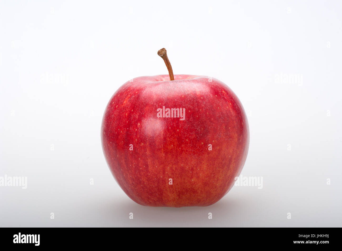 Tasty red apple on white background in front view Stock Photo - Alamy