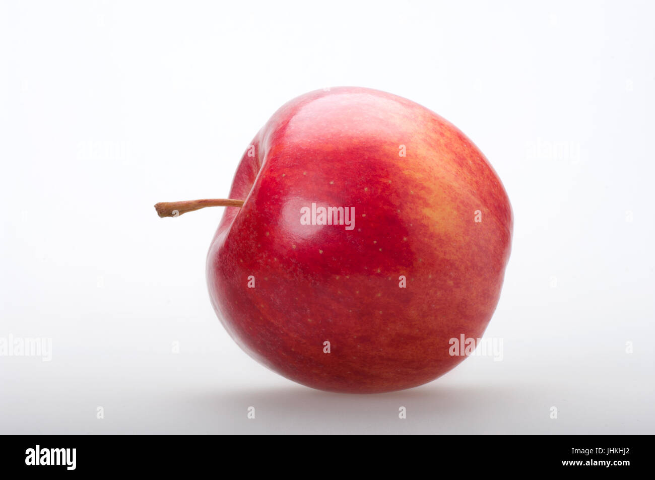 Tasty red apple on white background in front view Stock Photo - Alamy
