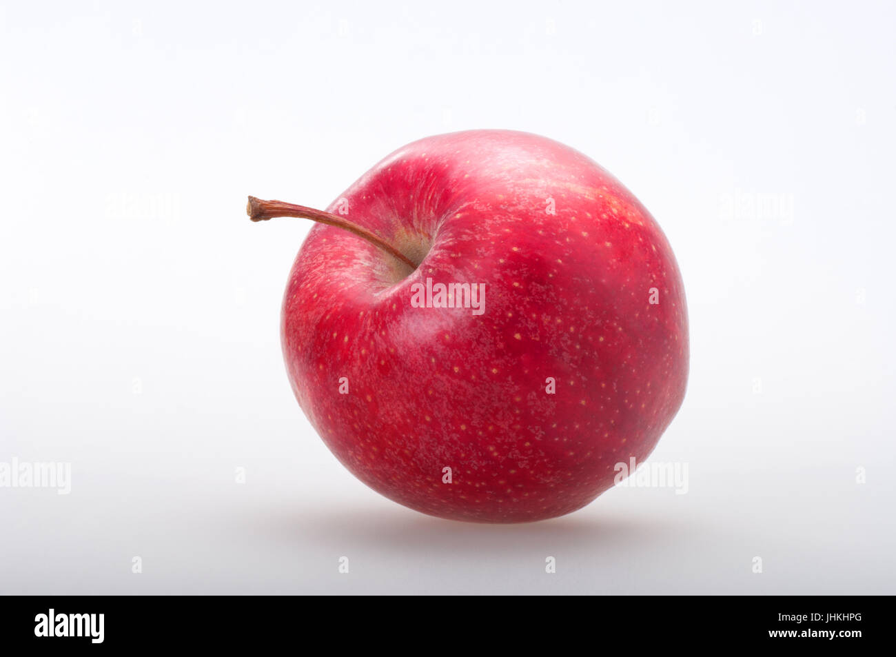 Tasty red apple on white background in front view Stock Photo - Alamy